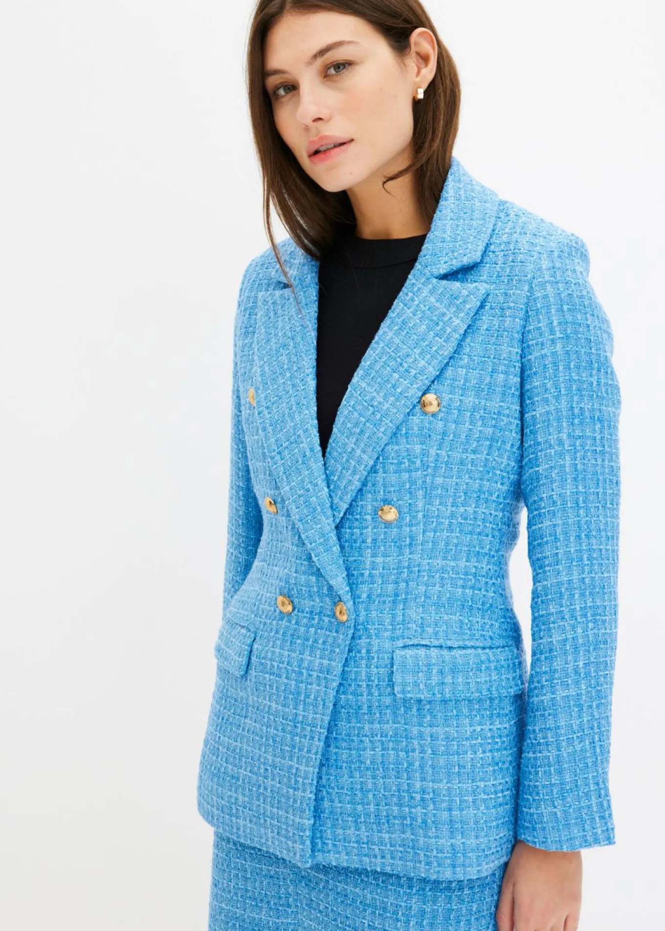 Americana de bouclé con doble botonadura