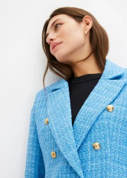 Americana de bouclé con doble botonadura