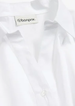 Blusa asimétrica con mangas abullonadas