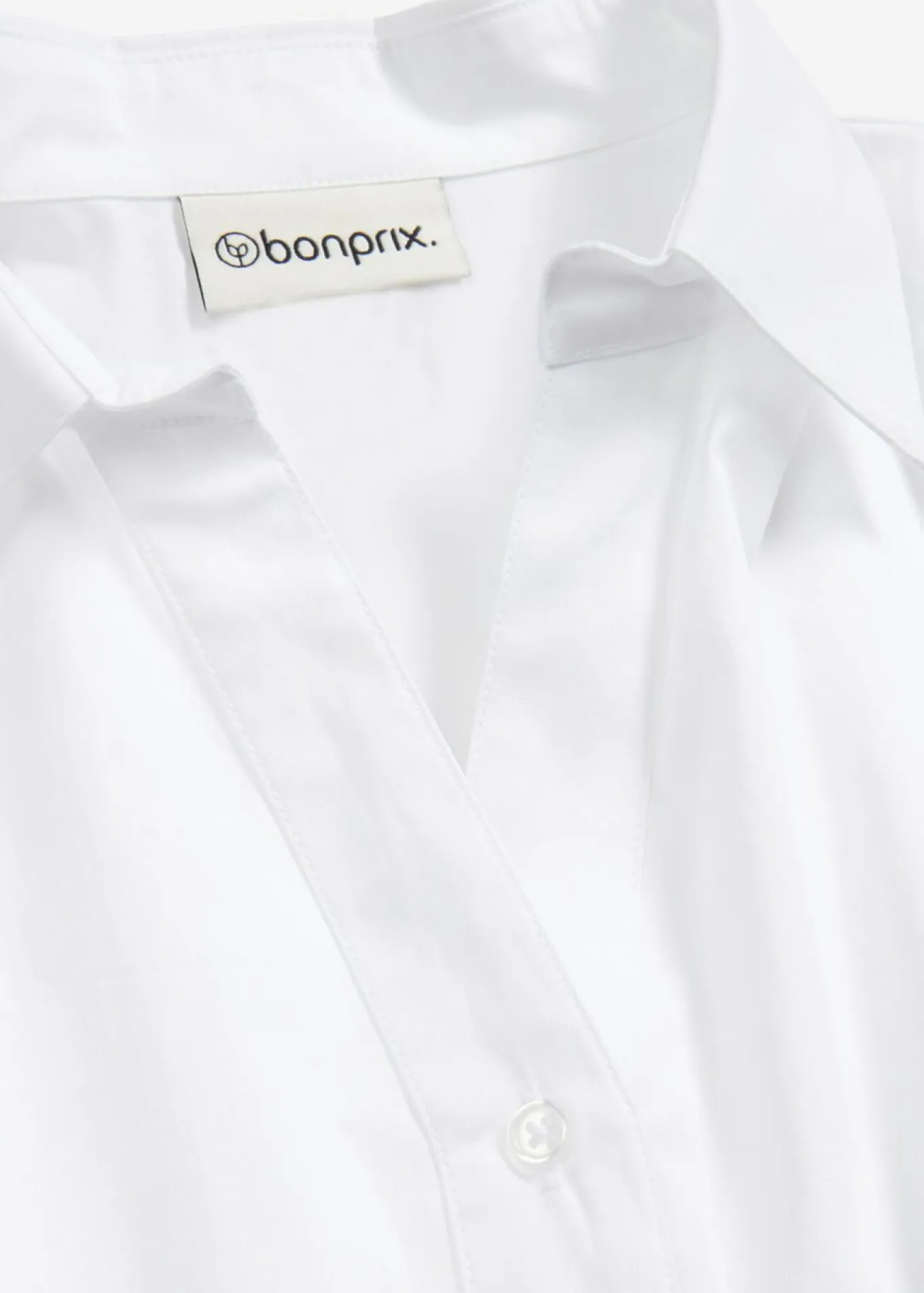 Blusa asimétrica con mangas abullonadas