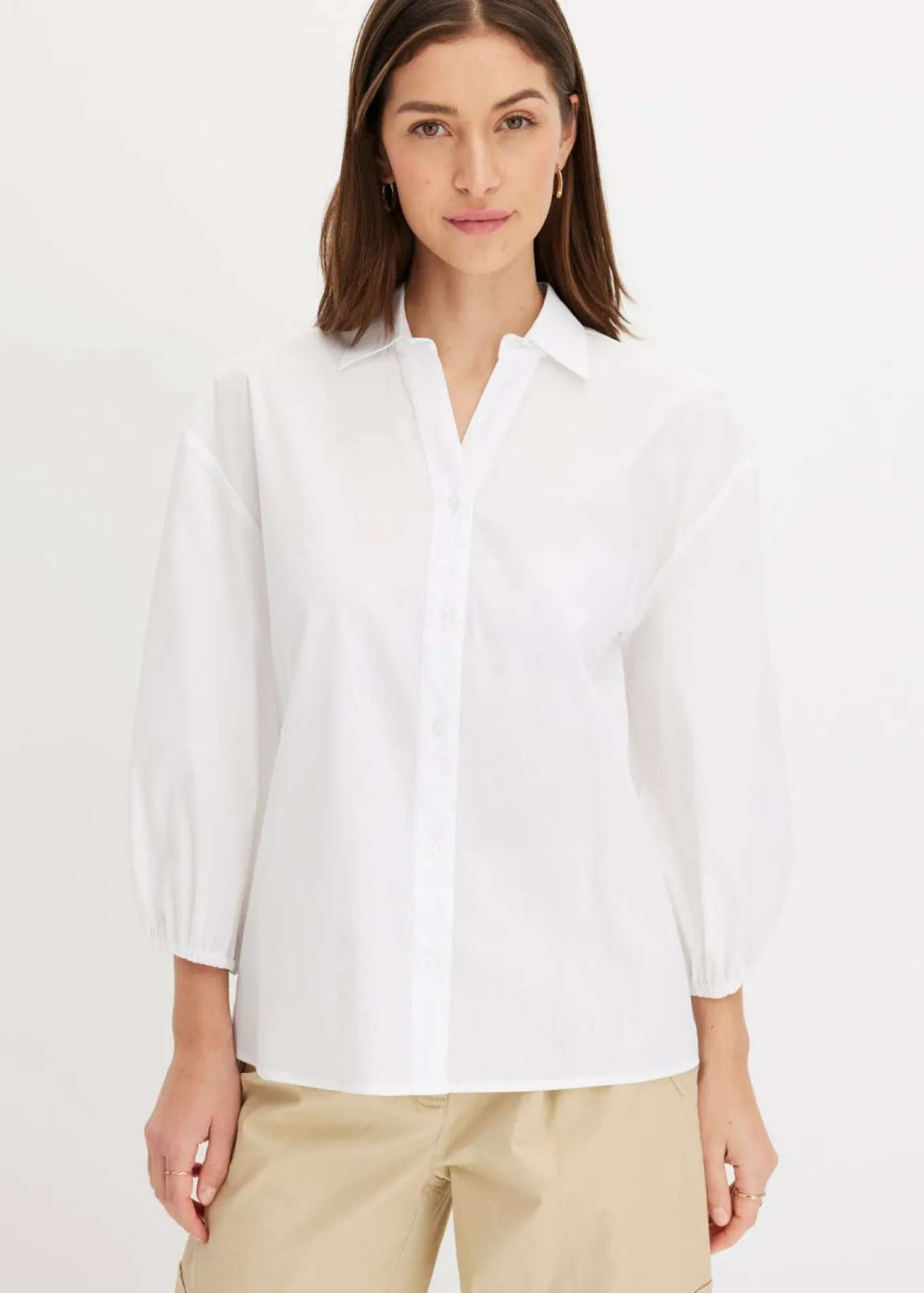 Blusa asimétrica con mangas abullonadas