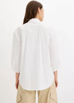 Blusa asimétrica con mangas abullonadas