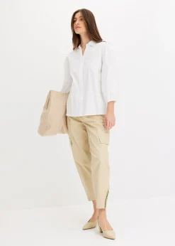 Blusa asimétrica con mangas abullonadas