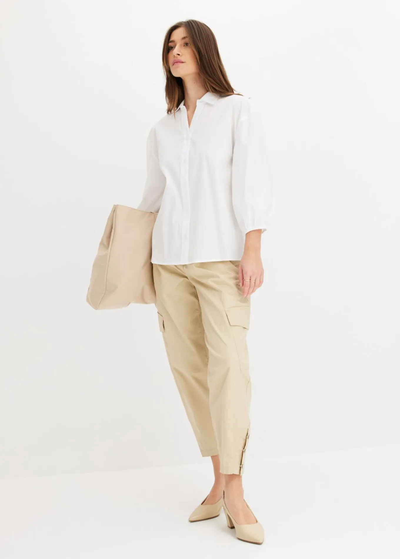 Blusa asimétrica con mangas abullonadas