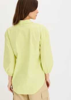 Blusa asimétrica con mangas abullonadas