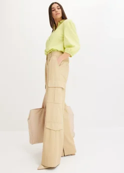 Blusa asimétrica con mangas abullonadas