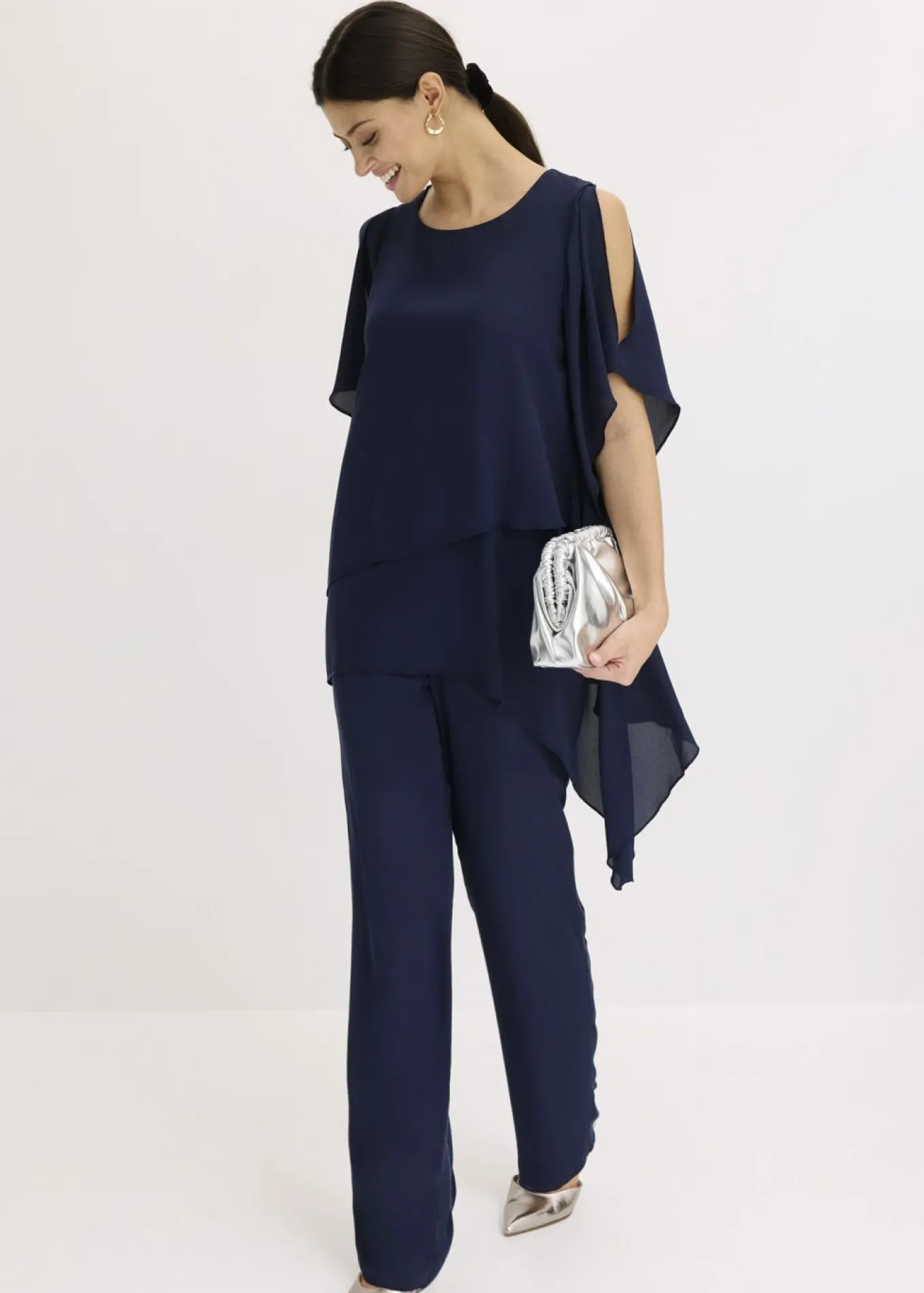 Blusa con cremallera con aspecto de capas