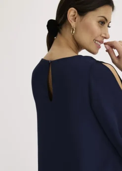 Blusa con cremallera con aspecto de capas
