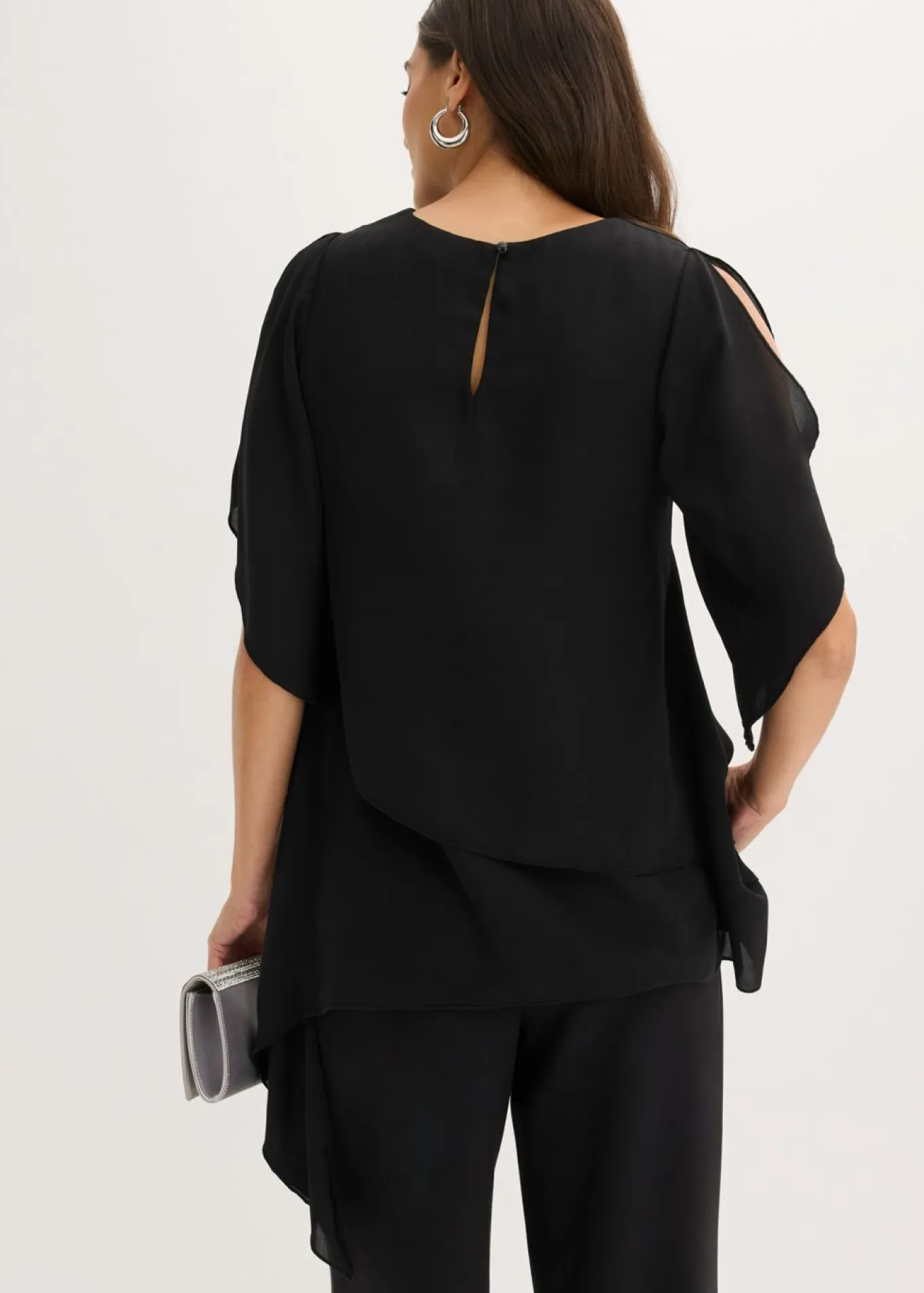 Blusa con cremallera con aspecto de capas