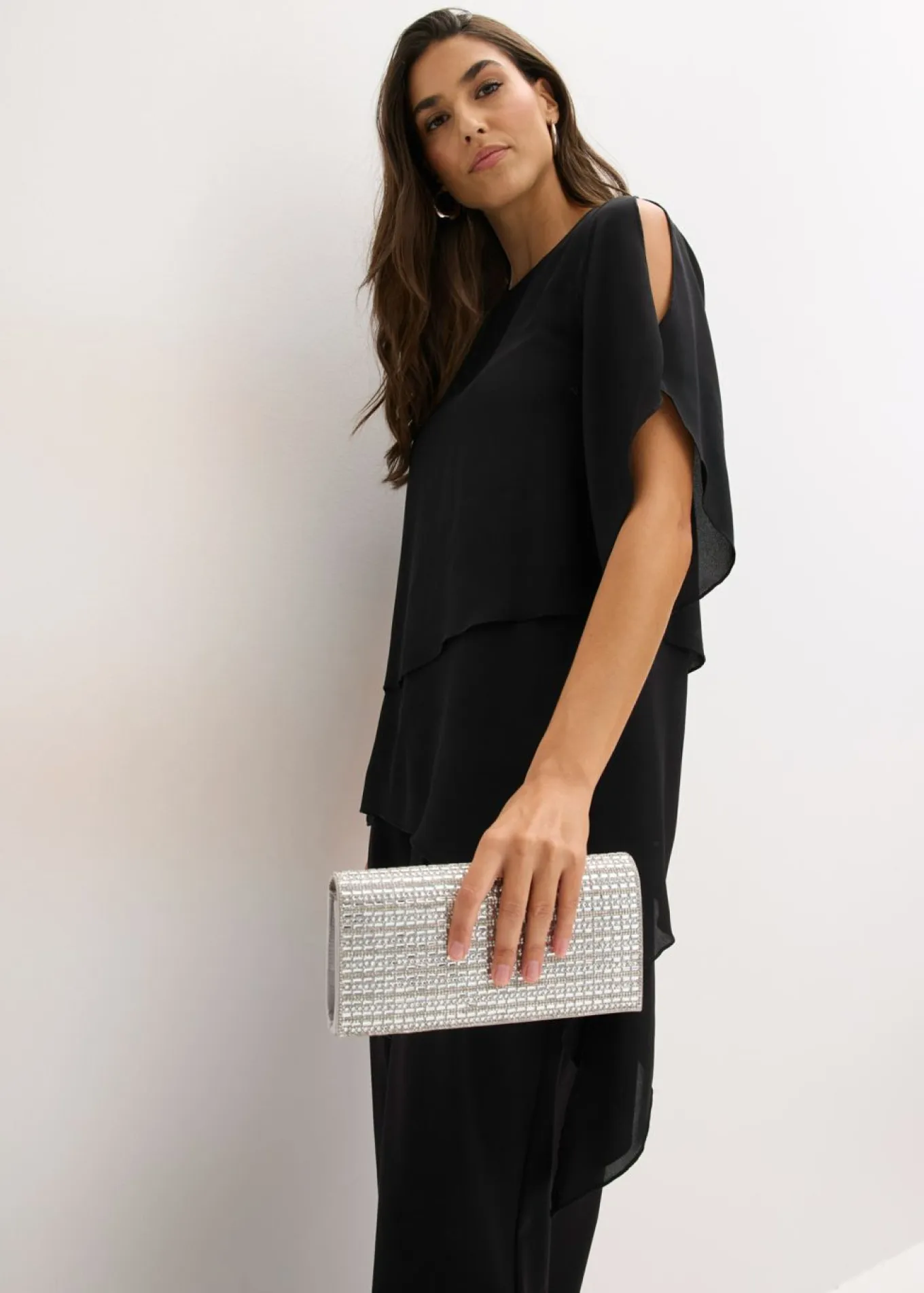 Blusa con cremallera con aspecto de capas