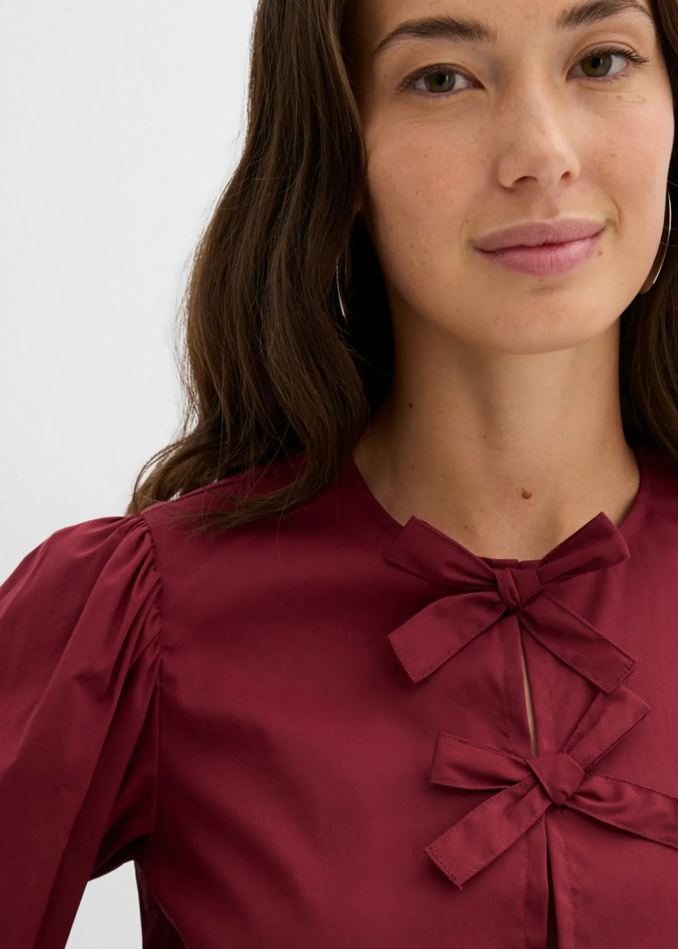 Blusa con detalles de lazo