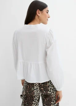 Blusa con detalles de lazo