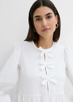 Blusa con detalles de lazo