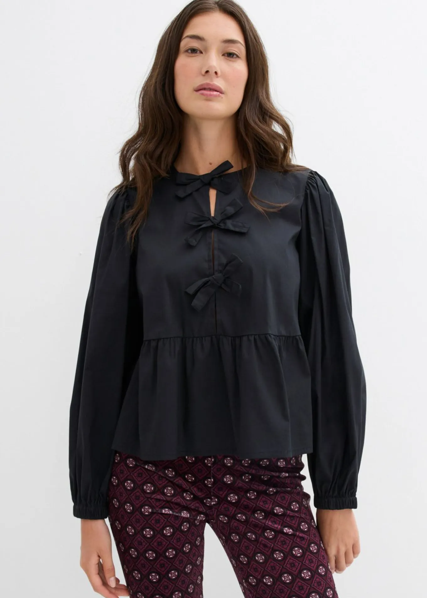 Blusa con detalles de lazo