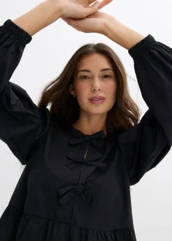 Blusa con detalles de lazo