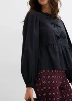 Blusa con detalles de lazo