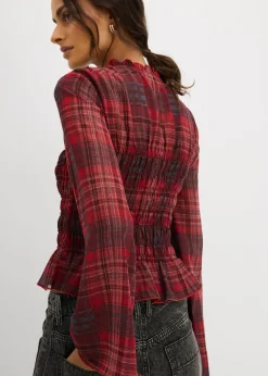 Blusa con inserto de nido de abeja