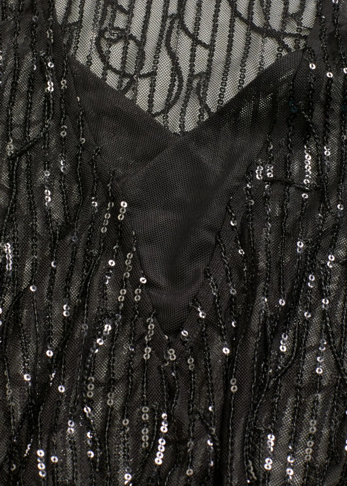 Blusa con lentejuelas y flecos