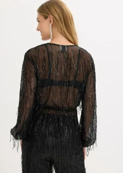 Blusa con lentejuelas y flecos