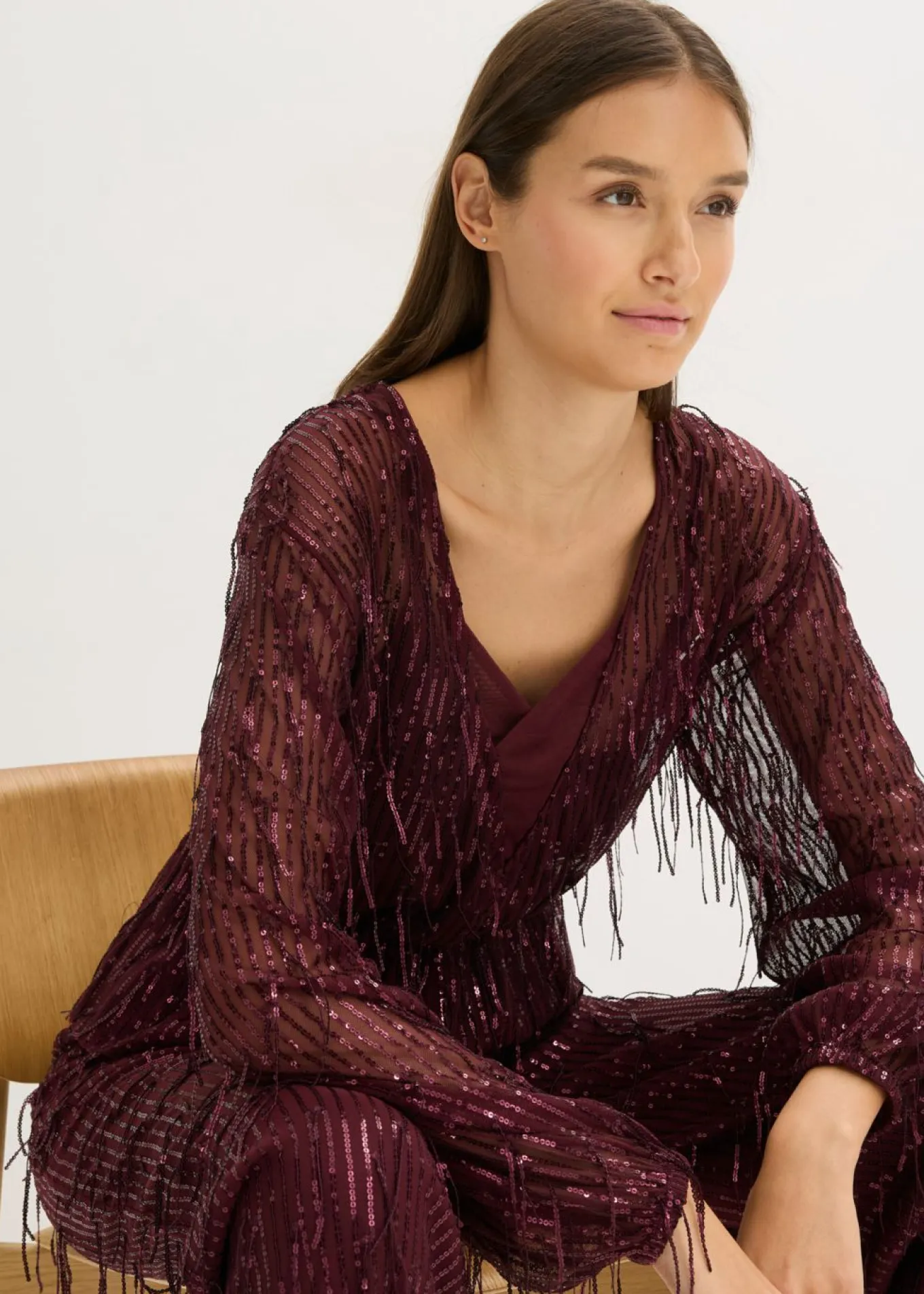 Blusa con lentejuelas y flecos