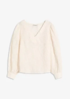 Blusa con patrón de flores estructurado