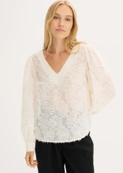 Blusa con patrón de flores estructurado