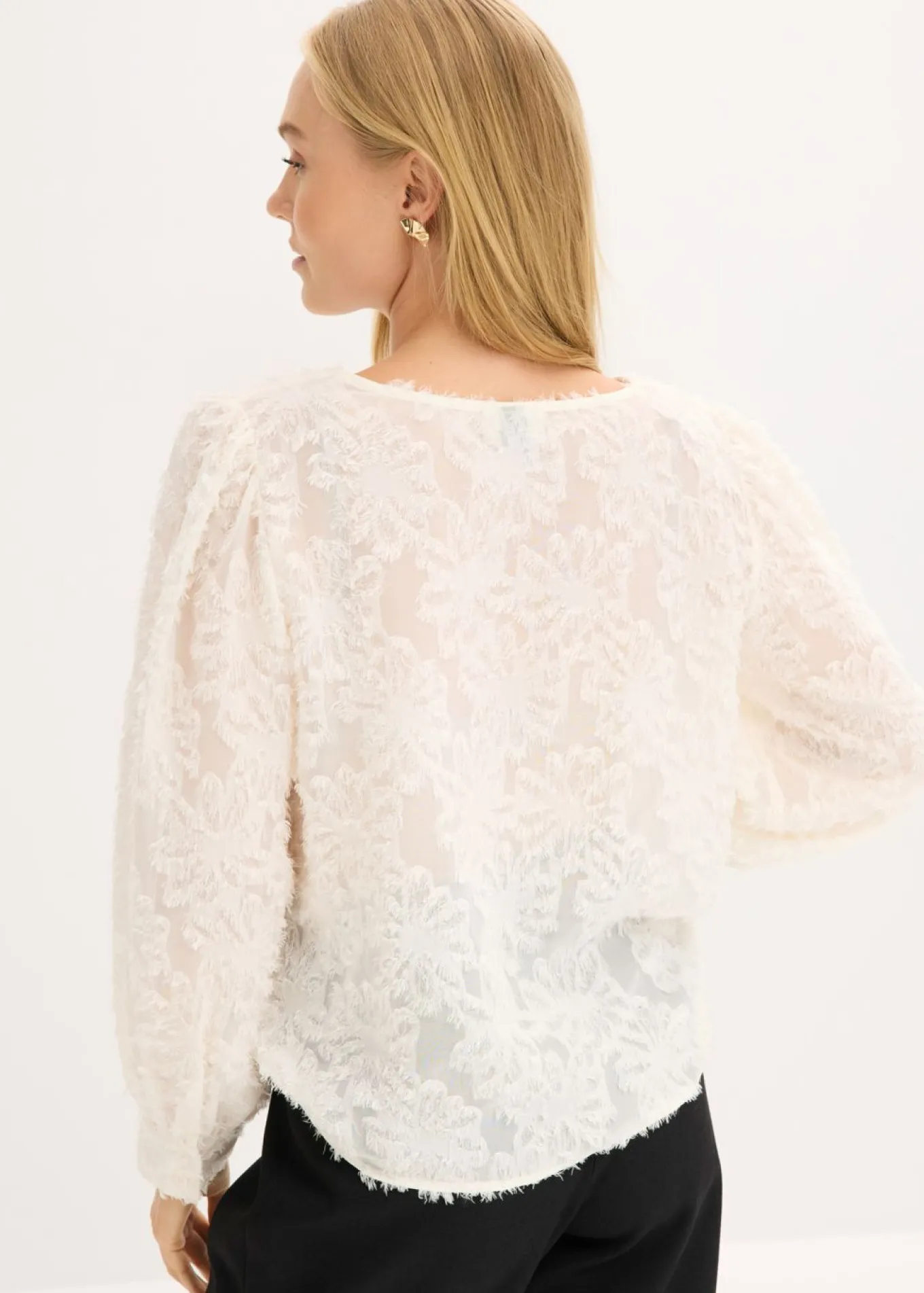 Blusa con patrón de flores estructurado