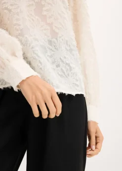 Blusa con patrón de flores estructurado