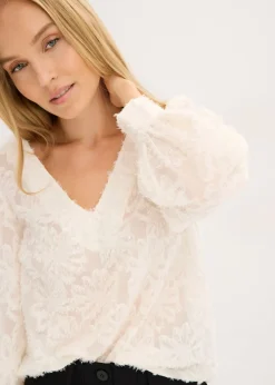 Blusa con patrón de flores estructurado