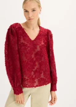 Blusa con patrón de flores estructurado
