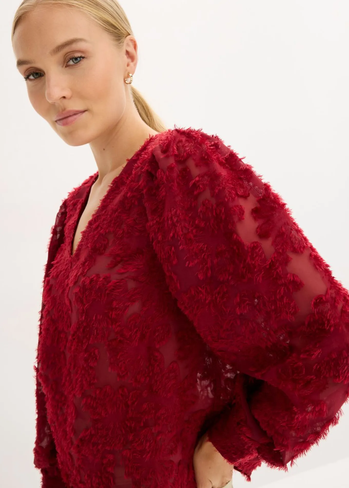 Blusa con patrón de flores estructurado