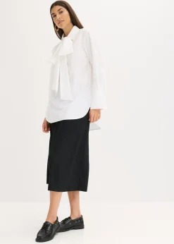Blusa con solapa de algodón puro