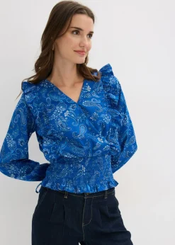 Blusa con volantes y nido de abeja