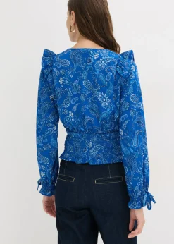 Blusa con volantes y nido de abeja