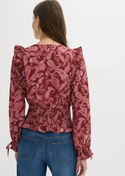Blusa con volantes y nido de abeja