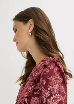 Blusa con volantes y nido de abeja