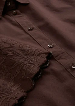 Blusa corta con contenido de seda