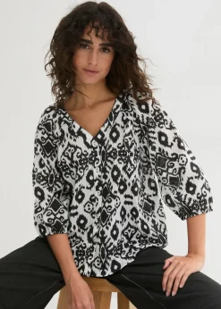 Blusa de algodón puro