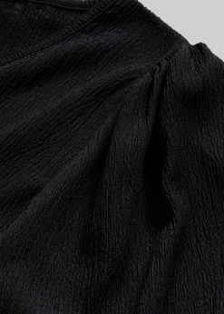 Blusa de crepé estructurado