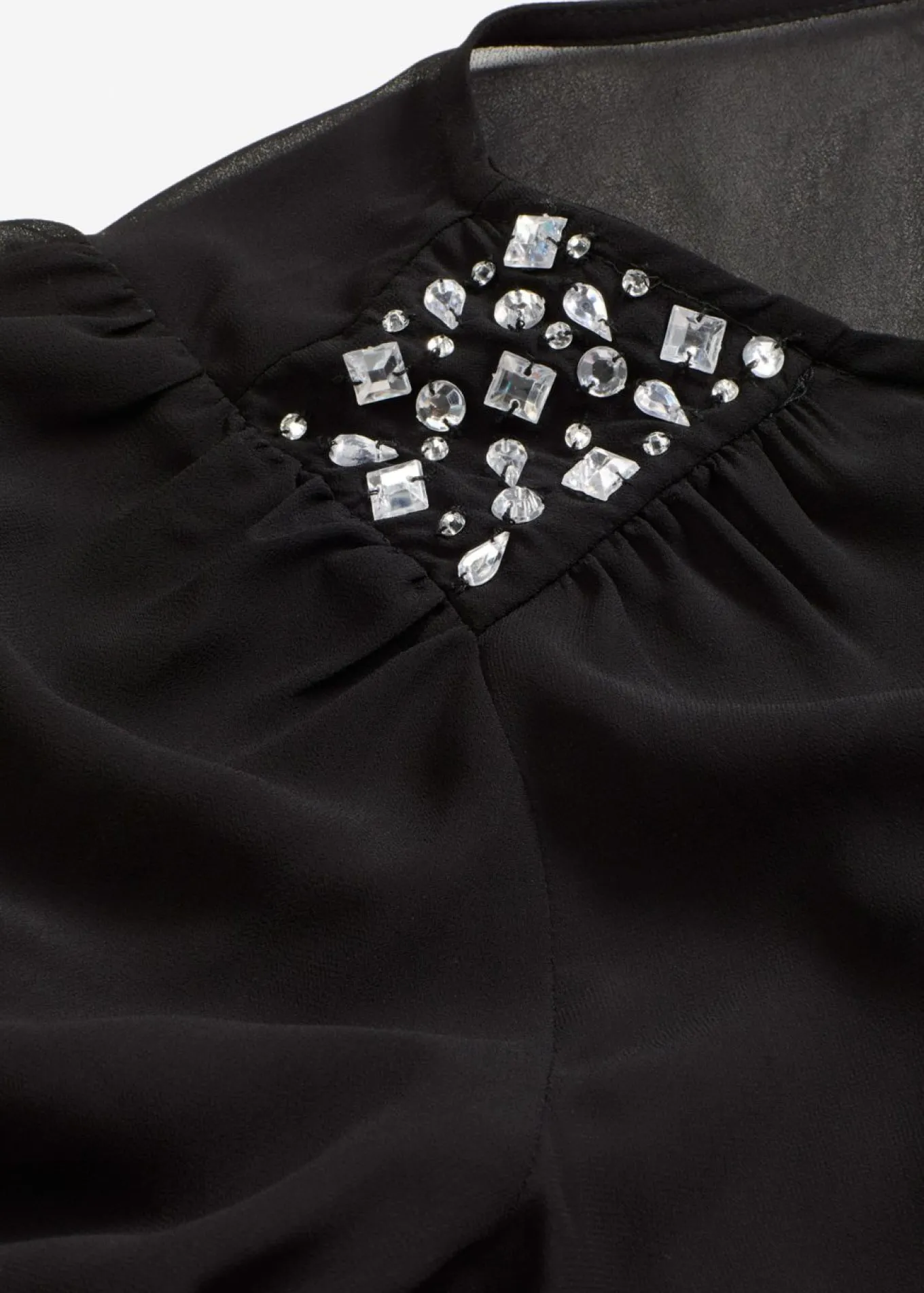 Blusa de gasa con adornos de piedras brillantes