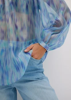 Blusa de gasa con un hombro al descubierto