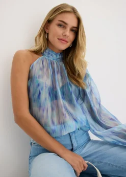 Blusa de gasa con un hombro al descubierto