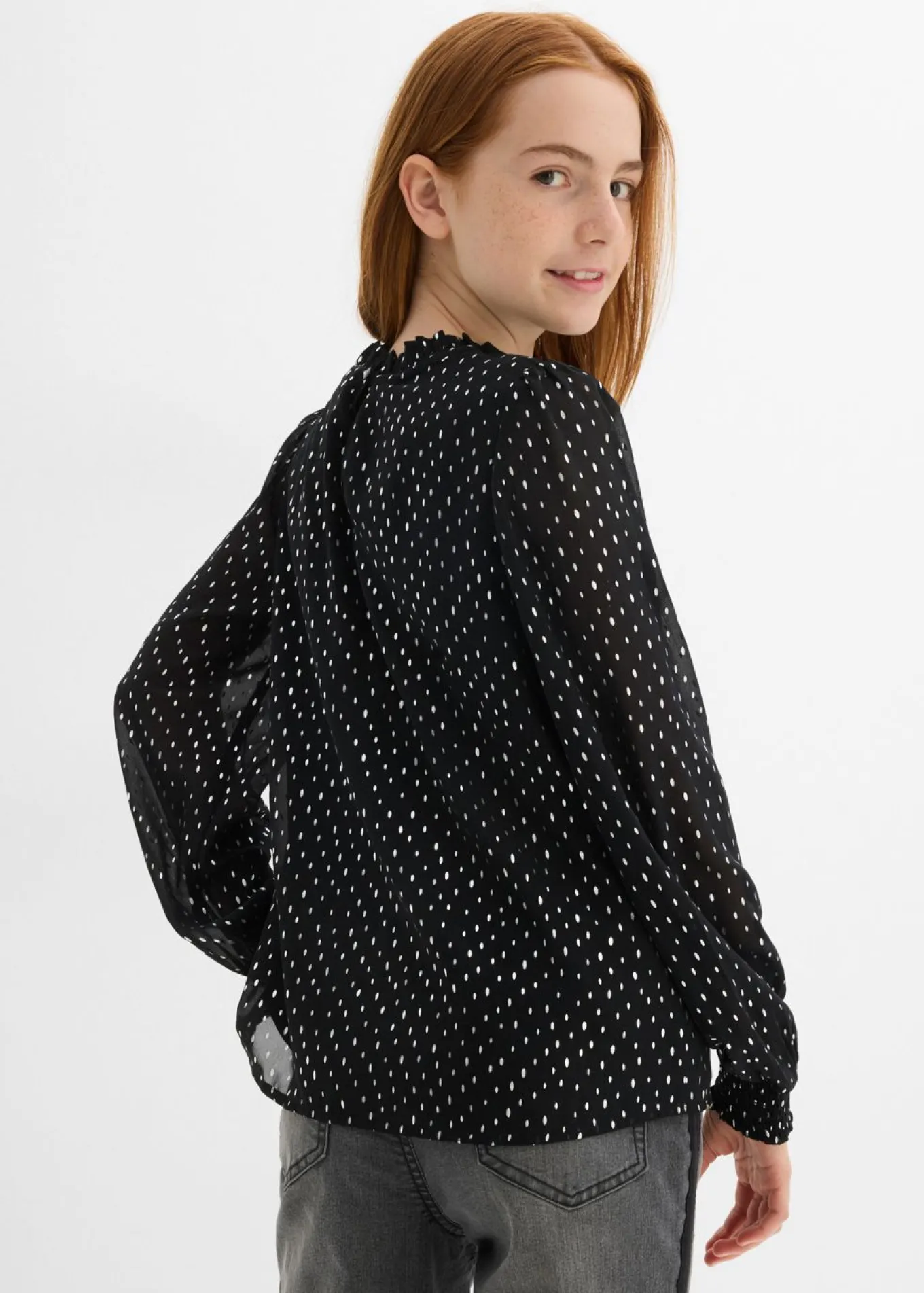 Blusa de gasa con volantes en el cuello
