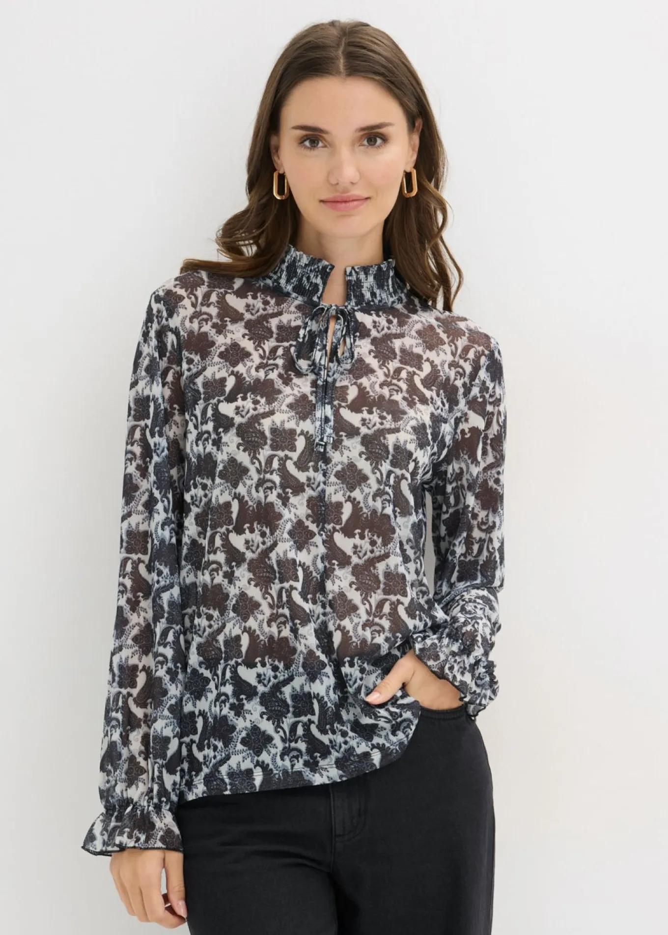 Blusa de malla fina
