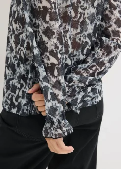 Blusa de malla fina