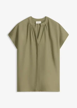 Blusa de manga corta con botones ocultos