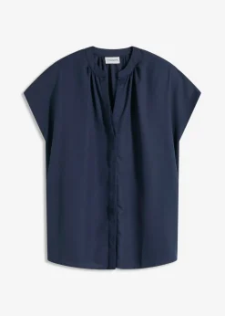 Blusa de manga corta con botones ocultos
