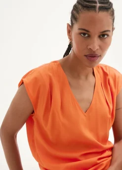 Blusa de manga corta con escote en V