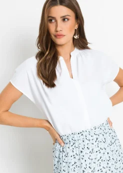 Blusa de manga corta con botones ocultos