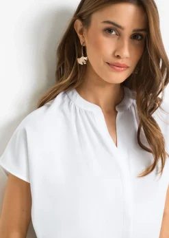 Blusa de manga corta con botones ocultos